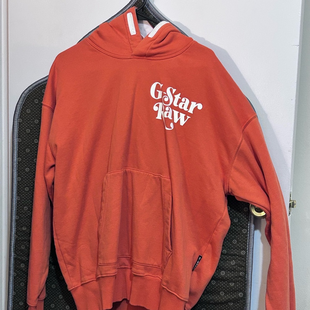 Size medium g star sweater with hoodie it’s thick with a lil weight to it. Fresh